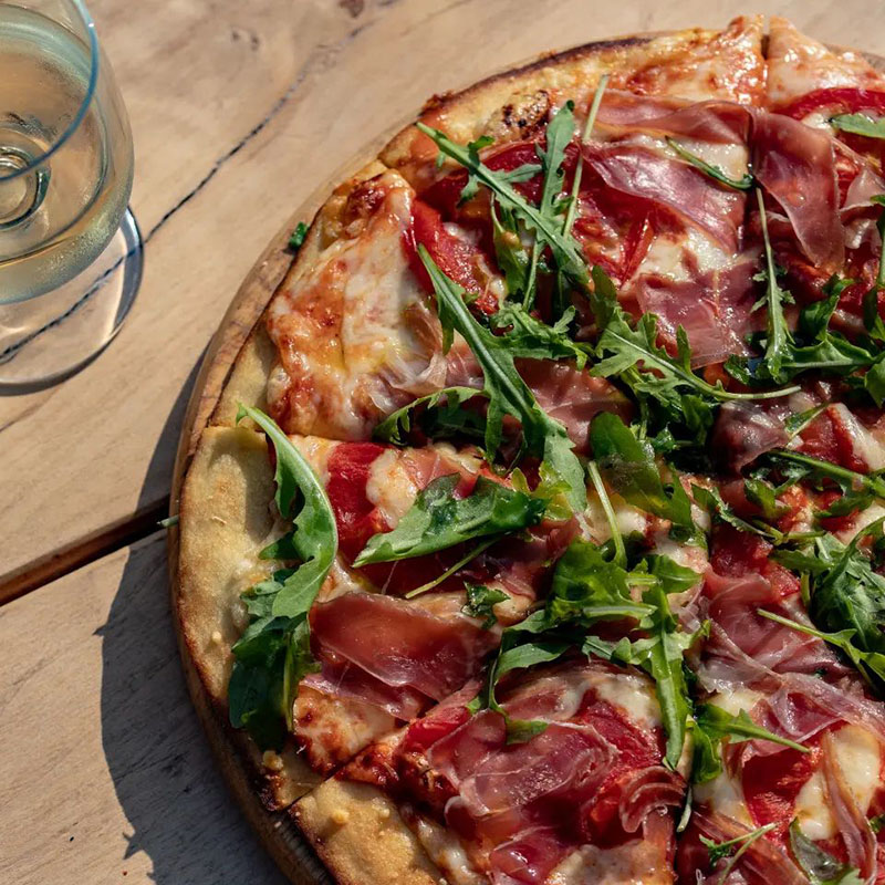 A snapshot of pizza and wine
